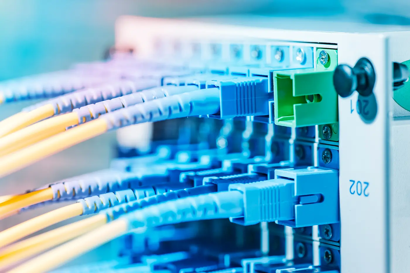 Fiber and network connections installed in communications equipment